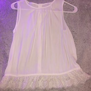 white flowy button up in the back tank top